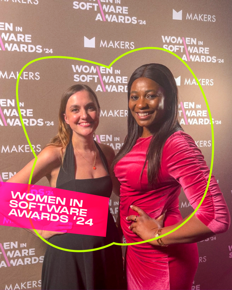 Emilly Hall-Strutt and Gayle Thompson-Igwebike smiling in front of a backdrop for the Women in Software Awards.